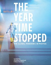 bokomslag The Year Time Stopped: The Global Pandemic in Photos