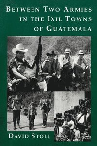bokomslag Between Two Armies in the Ixil Towns of Guatemala