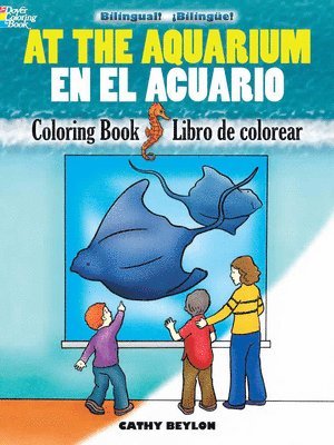 bokomslag At the Aquarium Coloring Book/En El Acuario Libro De Colorear