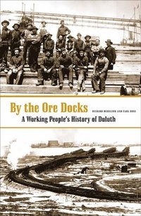 bokomslag By The Ore Docks
