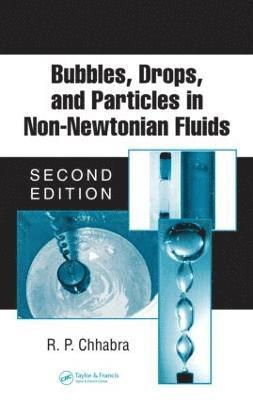 Bubbles, Drops, and Particles in Non-Newtonian Fluids 1