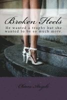 bokomslag Broken Heels: Phoenix left her dark past to make it in New York City. But when she meets the rich and powerful Dexter Stiles not onl