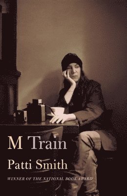 bokomslag M Train