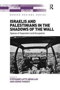 bokomslag Israelis and Palestinians in the Shadows of the Wall