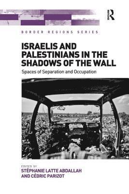 Israelis and Palestinians in the Shadows of the Wall 1
