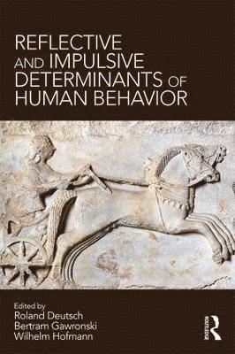 Reflective and Impulsive Determinants of Human Behavior 1