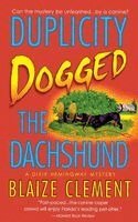 Blaize Clement - Duplicity Dogged the Dachshund: The Second Dixie Hemingway Mystery, Häftad