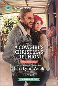 bokomslag A Cowgirl's Christmas Reunion: A Clean and Uplifting Romance