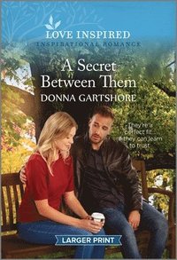 bokomslag A Secret Between Them: An Uplifting Inspirational Romance