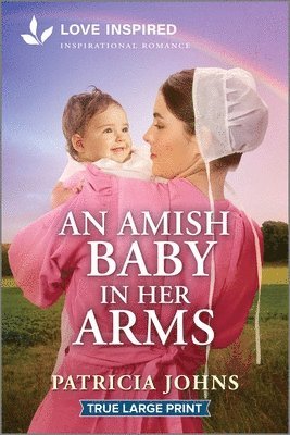 bokomslag An Amish Baby in Her Arms