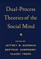 Dual-Process Theories of the Social Mind 1