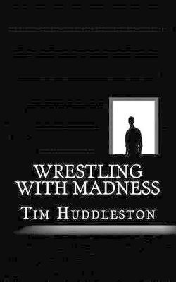 bokomslag Wrestling With Madness