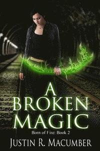 bokomslag A Broken Magic: Born of Fire - Book 2