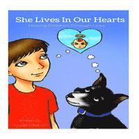 bokomslag She Lives In Our Hearts: Helping Children Through Prior Sibling Loss