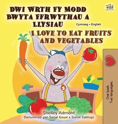 I Love to Eat Fruits and Vegetables (Welsh English Bilingual Children's Book) 1
