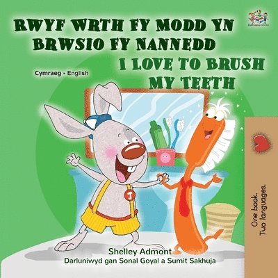 I Love to Brush My Teeth (Welsh English Bilingual Children's Book) 1