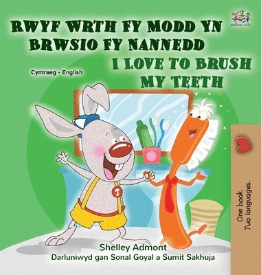 I Love to Brush My Teeth (Welsh English Bilingual Children's Book) 1