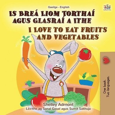 bokomslag I Love to Eat Fruits and Vegetables (Irish English Bilingual Book for Kids)