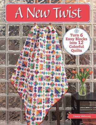 bokomslag A New Twist: Turn 6 Easy Blocks Into 12 Colorful Quilts