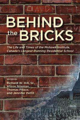 bokomslag Behind the Bricks