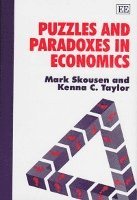 bokomslag Puzzles and Paradoxes in Economics