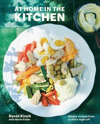 bokomslag At Home in the Kitchen: A Cookbook