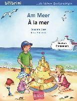 bokomslag Am Meer. Kinderbuch Deutsch-Französisch