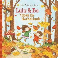 Lulu & Bo toben im Herbstlaub 1