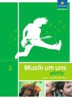 bokomslag Musik um uns SI - Arbeits- und Musizierheft 2 (7.-9. Schuljahr)