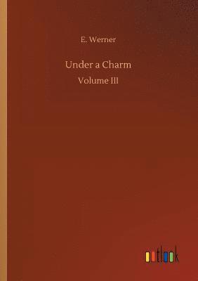 E Werner - Under a Charm, Häftad