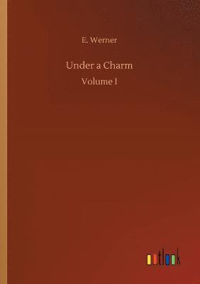 E Werner - Under a Charm, Häftad