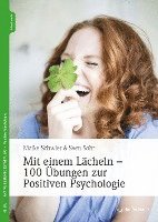 bokomslag Mit einem Lächeln - 100 Übungen zur Positiven Psychologie