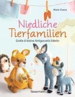 bokomslag Niedliche Tierfamilien - Große und kleine Amigurumis häkeln