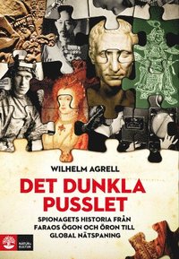 bokomslag Det dunkla pusslet : Spionagets historia - från faraos ögon och öron till g