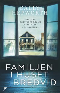 bokomslag Familjen i huset bredvid