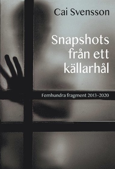 bokomslag Snapshots från ett källarhål