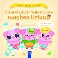 bokomslag Geschichtenbuch mit Spielfigur - Die drei kleinen Schweinchen machen Urlaub
