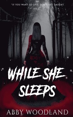 Abby Woodland - While She Sleeps, Häftad