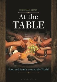 bokomslag At the Table